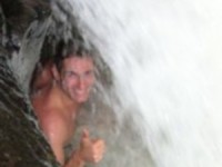 Michael Ducharme bathing in a waterfall in Panama